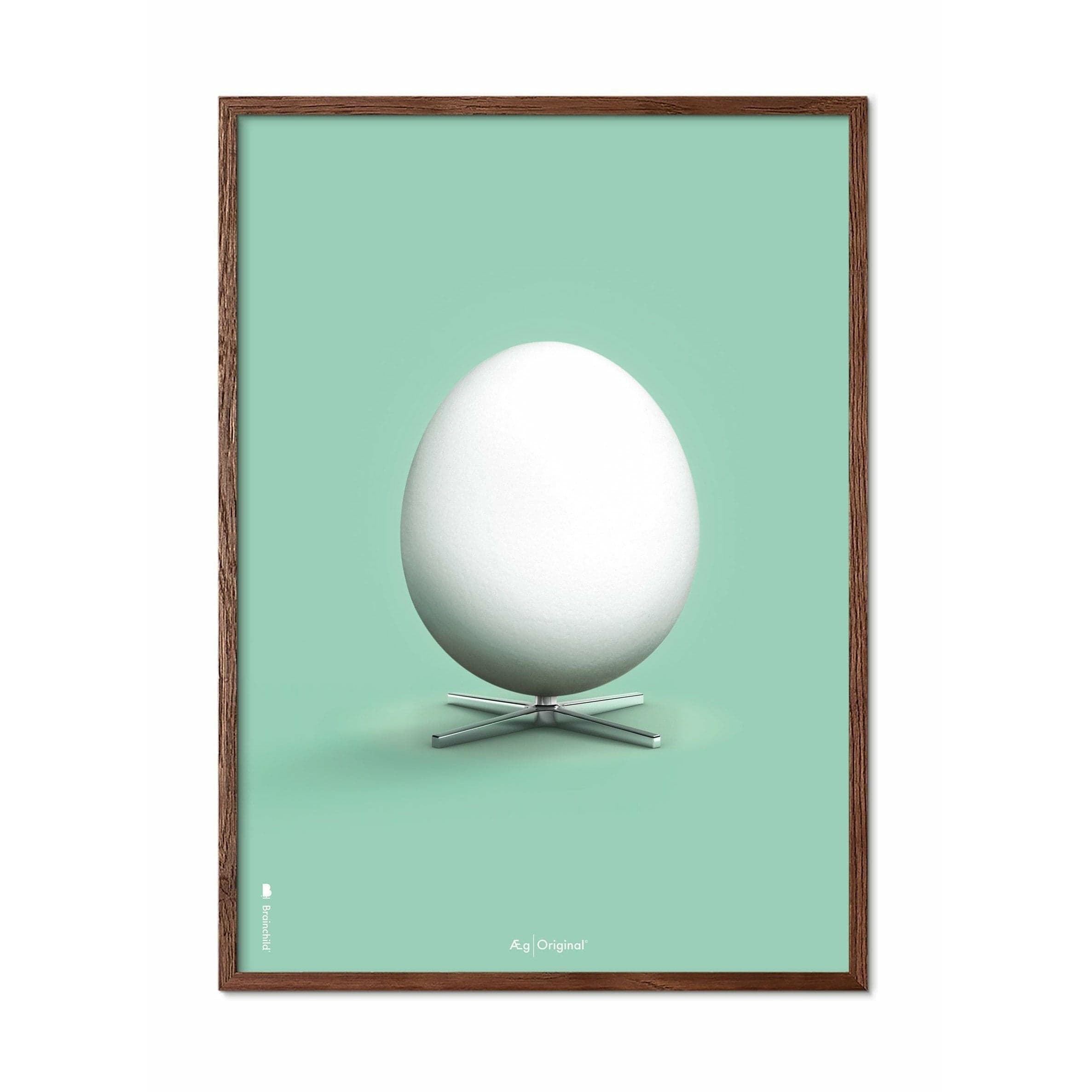 Hugarfóstur egg klassísk veggspjald, ramma úr dökkum tré 50x70 cm, myntugrænn bakgrunnur