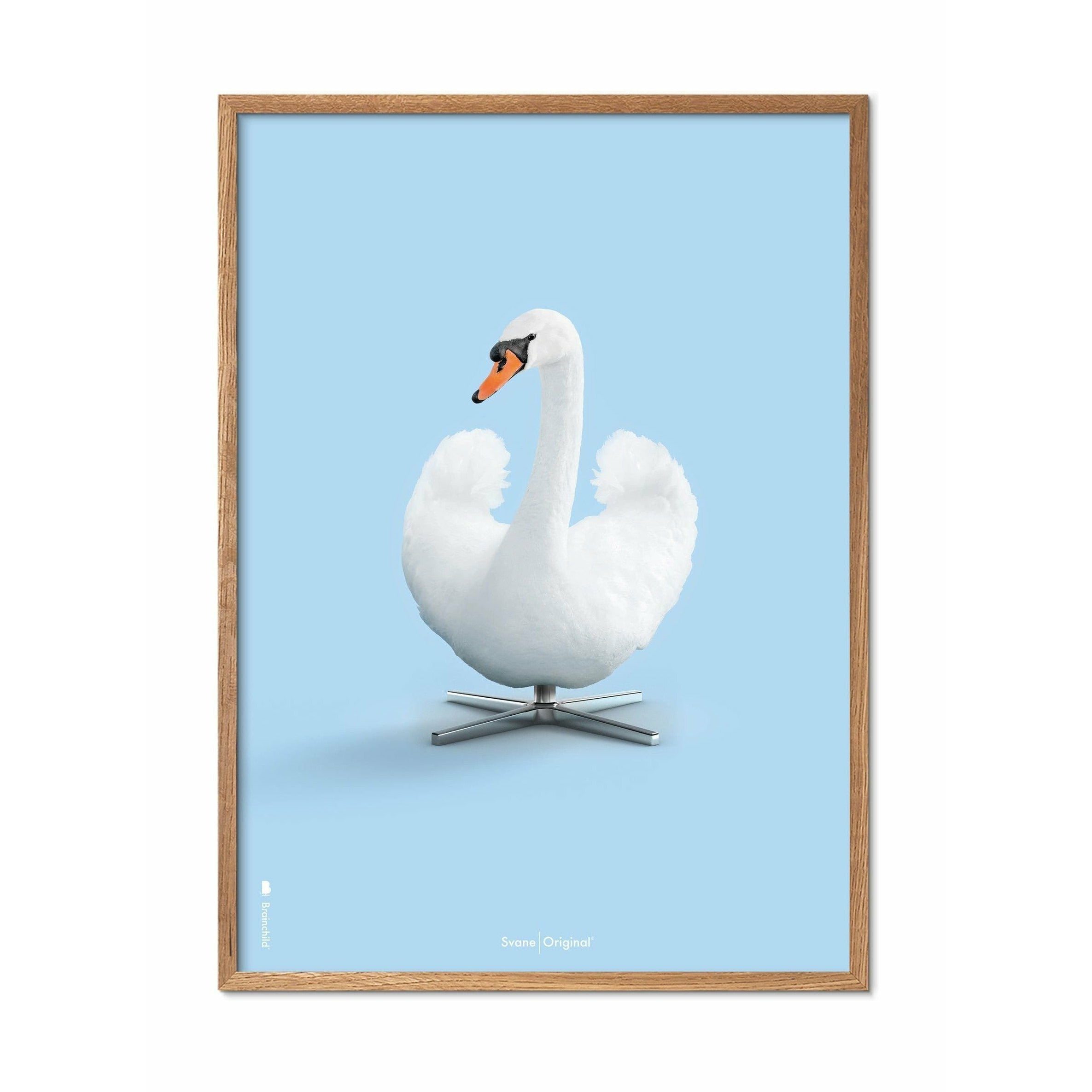 Brainchild Swan Classic Poster, Frame Made Of Light Wood 50x70 Cm, Light Blue Background