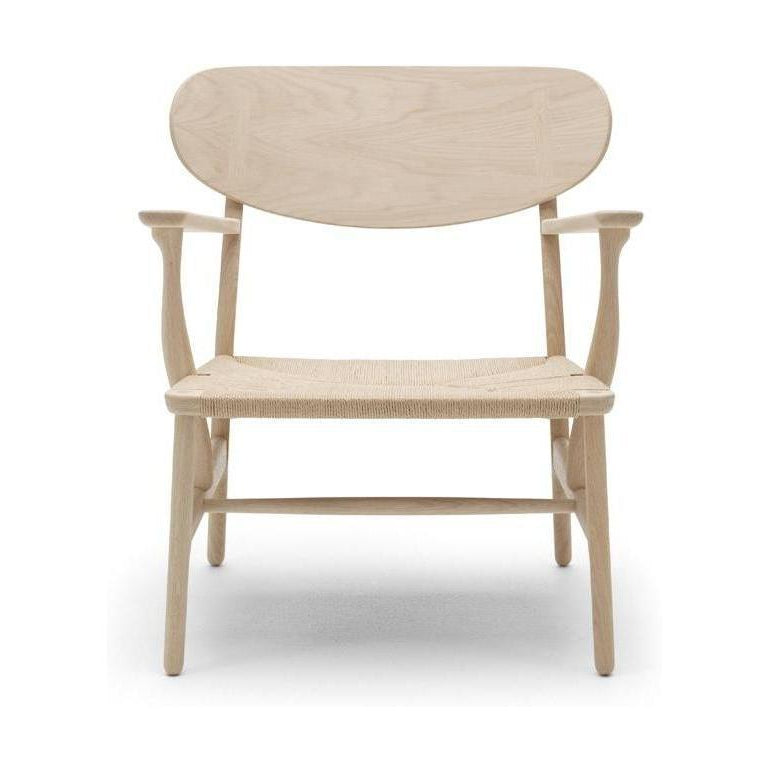 Carl Hansen CH22 Lounge -tuoli, saippuaa tammi/luonnollinen johto