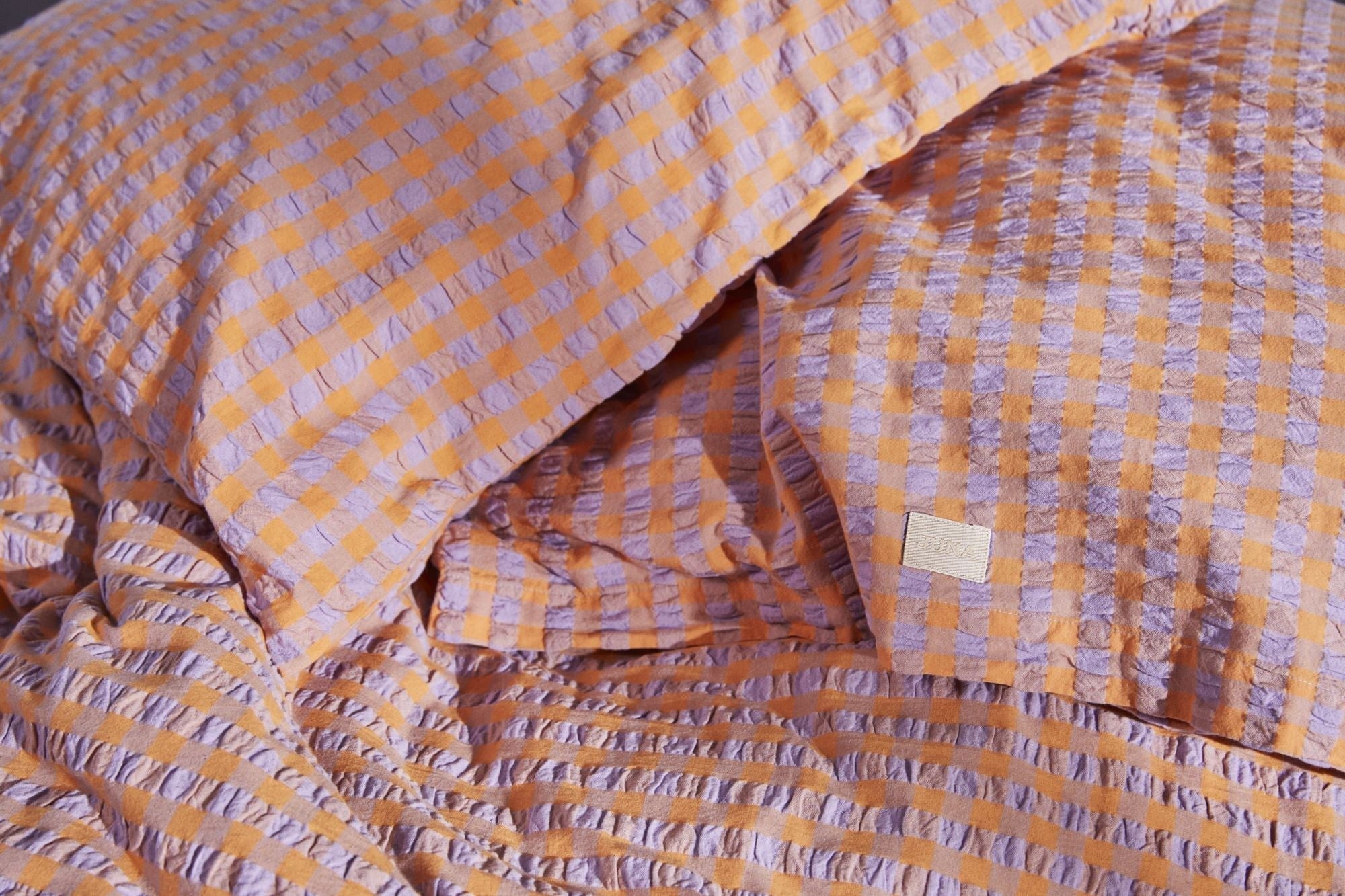 Juna Bæk y Bølge Pillowcase de 63x60 cm, azul lavanda/durazno