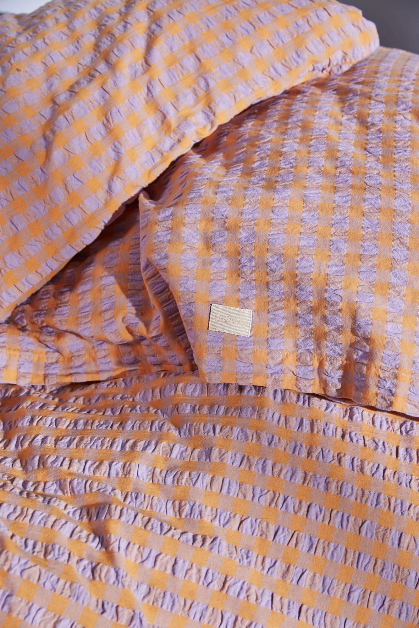 Juna Bæk y Bølge Pillowcase de 63x60 cm, azul lavanda/durazno