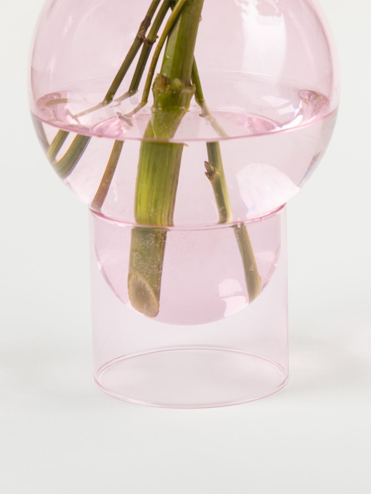 Vase de tube à bulles sur le vase à bulles, rose