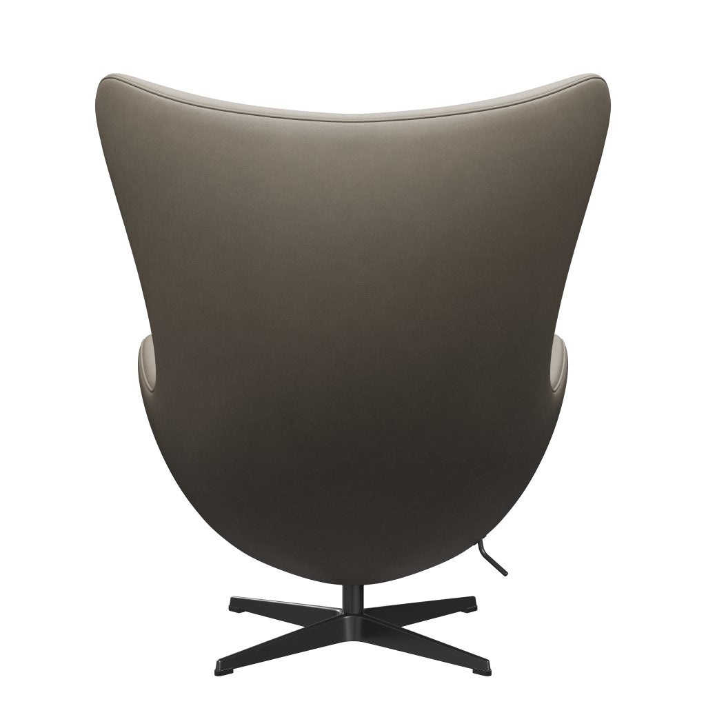Fritz Hansen Muna -lounge -tuolin nahka, musta/välttämätön vaaleanharmaa